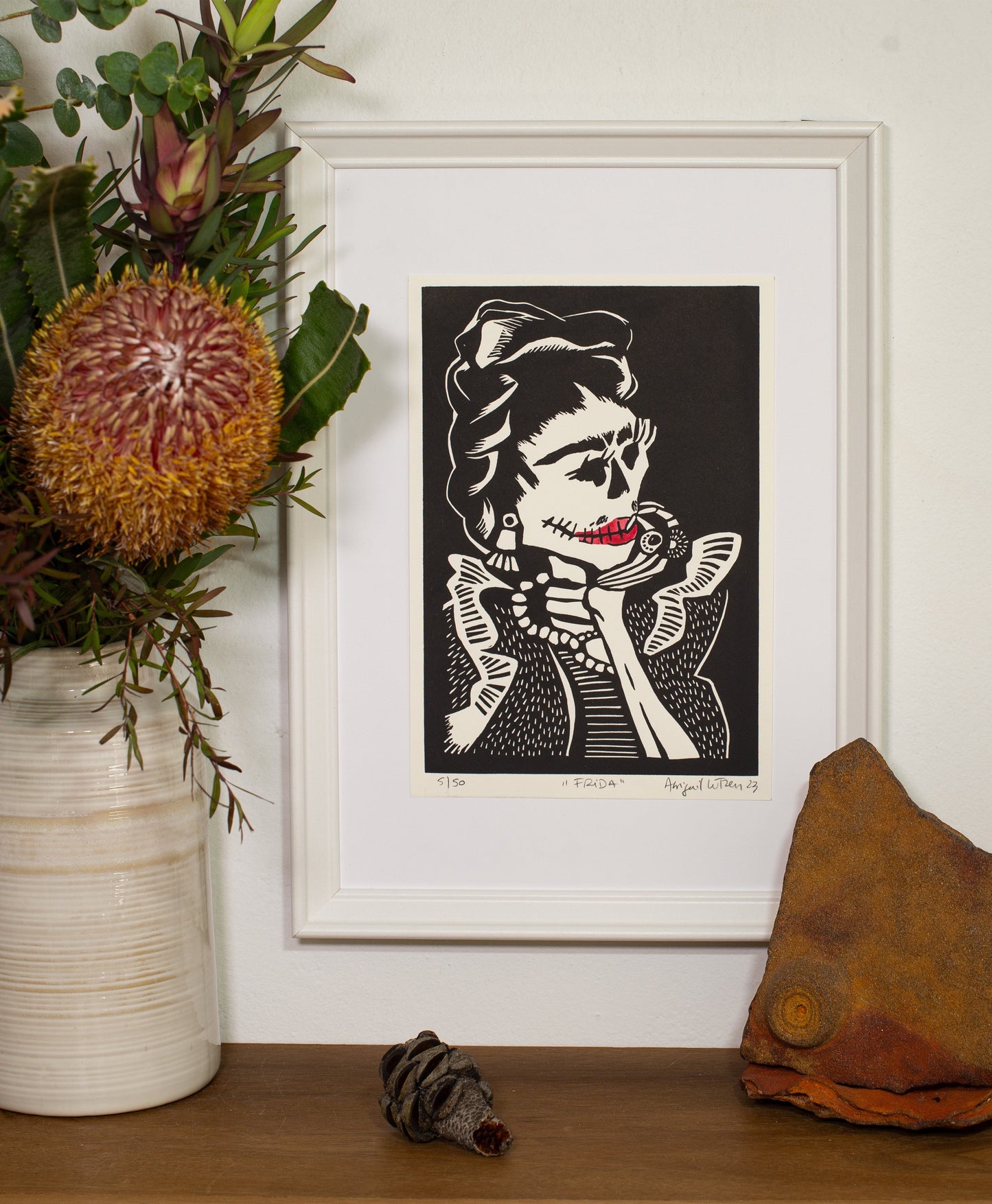 Frida linocut print, framed and displayed