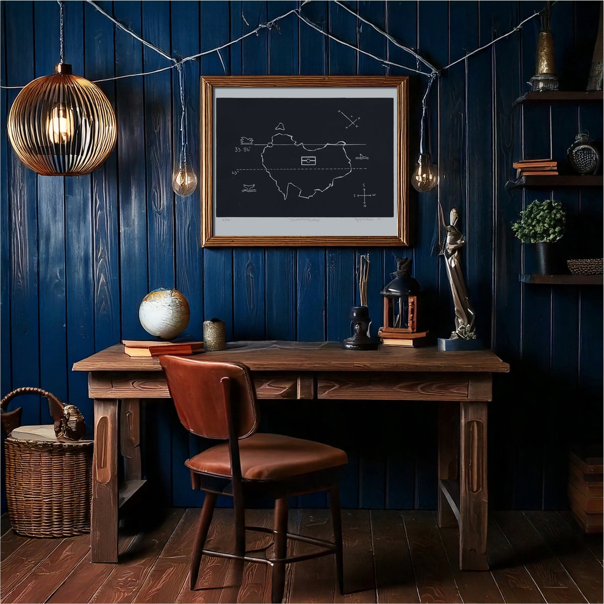 The UpsideDown(under) print framed above a desk in a dark blue study